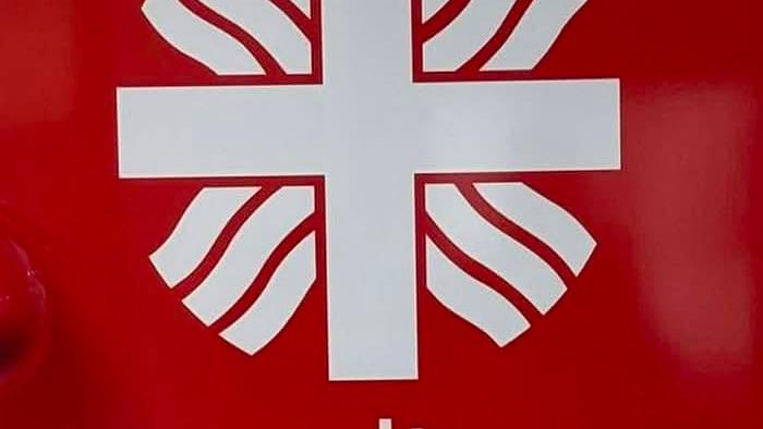 Das rote Logo der Caritas