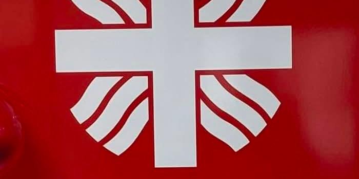 Das rote Logo der Caritas